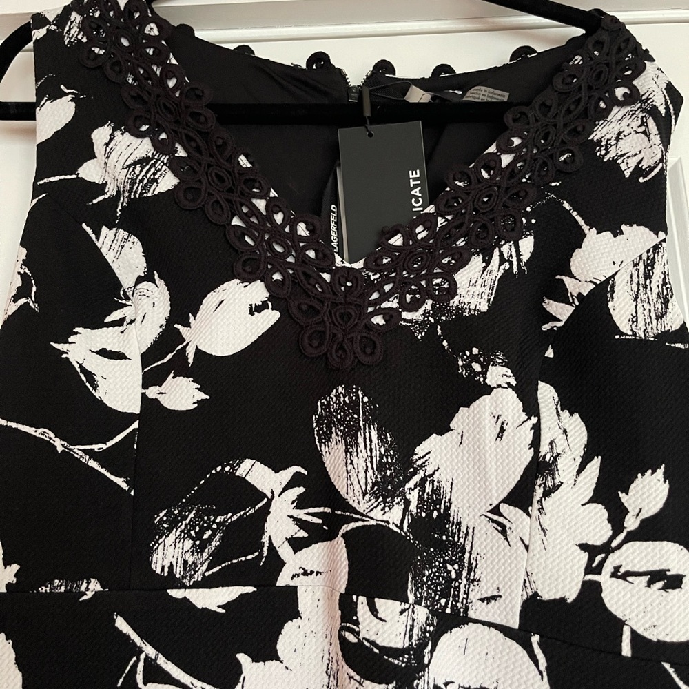 NWT Karl Lagerfeld Paris sleeveless dress. Black and white with lace borders.